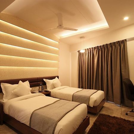 Hotel Bait Inn Ахмедабад Стая снимка