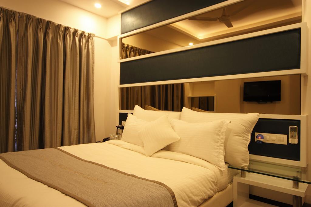 Hotel Bait Inn Ахмедабад Стая снимка