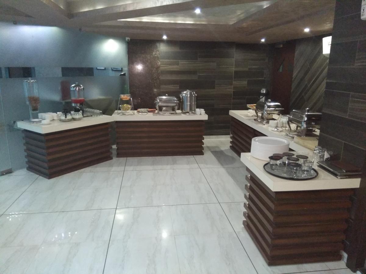 Hotel Bait Inn Ахмедабад Екстериор снимка